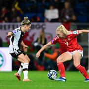 Ceri Holland in action for Wales against Germany.