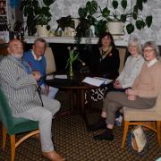 Sgt Muston's family with Oswestry family history group members Kenton Owen and Karen Ethelston.