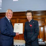 John Ridgers receives his award from Her Royal Highness, Anne, The Princess Royal.