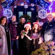 Cllr Olly Rose, Natalie Bainbridge with Donna Davies and her family and the winning garden, with Andy Vaughan.