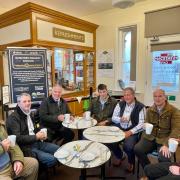 Simon Baynes with local Councillors and residents at the Gobowen Station Café in 2023, run by Derwen College.