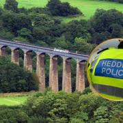 Pontcysyllte Aqueduct. Inset: North Wales Police jacket