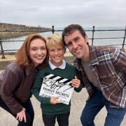 Eleanor Tomlinson, James Younger and Matthew Lewis on set
