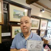 John Wilson, of Oswestry, with artworks by his late father, Gerry.