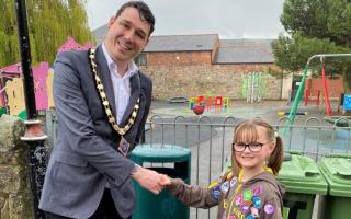 Mayor Moore and Demi with the newly installed recycling bins at Cae Glas Park