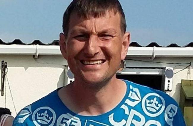 Andrew Hamilton, 42, was found dead at his home in Bagillt